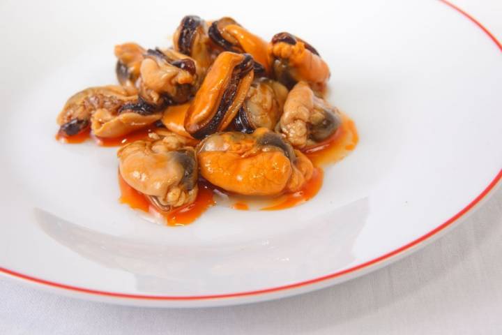 Mejillones en escabeche, un plato que no decepciona. Foto: Shutterstock.