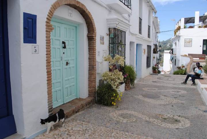 Descansando tras la subida a lo alto del pueblo.