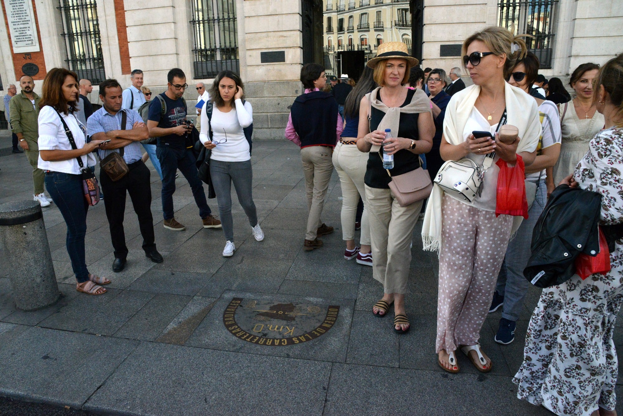 Turistas kilometro cero Madrid